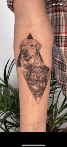 a woman's leg with three dogs on it