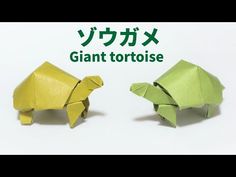 two origami elephants with the words giant tortoise written in english and japanese