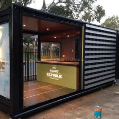 the shipping container is made to look like it has been converted into a bar