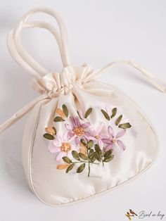 BirdinBag - Chic Mini Embroidered Bucket Bag with Drawstring Closure Beige Embroidered Bags As Gifts, Spring Embroidered Shoulder Bag For Gift, Embroidered Cream Bags For Gifts, Embroidered Cream Shoulder Bag As Gift, Beige Floral Embroidery Shoulder Bag Gift, Beige Floral Embroidered Shoulder Bag As Gift, Embroidered Pouch Bag For Spring, Spring Embroidered Pouch Bag, Embroidered Bags For Spring Gift