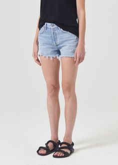 The fan-favorite Parker Short features a flattering high-rise with a relaxed silhouette through the hips - tailored to feel as if they were made just for you. Crafted in our signature zero stretch cotton, this pair will only get softer with each wash - making for the perfect wardrobe staple. For a longer inseam, shop the Parker Long. This fit is true to size. Looks Like: Best-selling classic indigo with subtle fading and a raw hemFeels Like: Washed down, non-stretch cotton with a vintage hand Perfect White Tee, Swimming Outfit, Solid & Striped, Perfect Wardrobe, Crop Top Sweater, Denim Short, Distressed Denim Shorts, Stretch Shorts, On Repeat