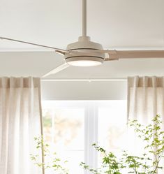 a white ceiling fan in a living room