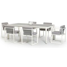 a white table with four chairs around it