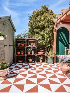 an outdoor patio with potted plants on it