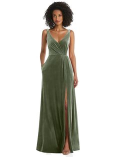 a woman in a long green dress