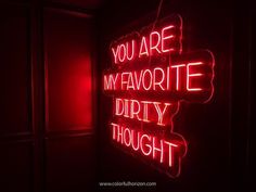 a red neon sign that says you are my favorite dirty thought on the side of a wall