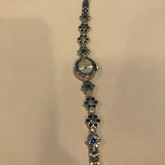 Nine West Crystal Rhinestone Gem Flower Watch Blue Nwot New Without Tags Needs Battery 7” Long And Can Remove A 1/2” Link To Make It About 6.5” New To Posh? Sign Up Now With My Code Krd00 To Save $10. Authentic Save On Bundles Ship Fast No Trades Dope Jewelry Accessories, Flower Watch, My Beautiful Daughter, Dope Jewelry, Jewelry Lookbook, Diy Stuff, Girly Jewelry, Jewelry Inspo, Bling Bling