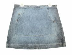 "Vintage 90's denim mini skirt with a high rise fitted waist and a mini length. Has a large pocket in front. Condition: Very good vintage. Best fits women's: Labelled Large Material: denim MEASUREMENTS Taken from seam to seam while the garment is lying flat. Double the armpit, waist, and hips Waist 16\" Waist to hem 15.5\" Hips 20\"" Cheap Dark Wash Short Denim Skirt, Cheap High-waist 90s Denim Skirt, Fitted 90s Skirt With Pockets, 90s Style Fitted Skirt With Pockets, 90s Fitted Skirt With Pockets, 90s Style Mini Denim Skirt With Pockets, 90s Mini Denim Skirt With Pockets, Retro Mini Denim Skirt With Pockets, Fitted 90s Denim Skirt With Pockets