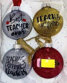 three christmas ornaments with writing on them