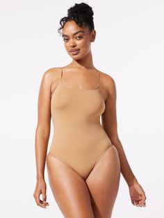 Savage, seamless, and super smooth, our Seamless Bodysuit Teddy was designed for all-day comfort and features a scoop neckline, high-leg bikini, and a logo accent in back. Made from a soft, seam-free material that stretches over your curves and holds you in all the right places. Seamless Bodysuit, All The Right Places, Savage X Fenty, Everyday Basics, Black Caviar, High Leg, Body Suit, Catsuit, A Logo