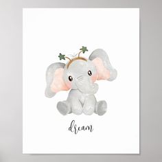 an elephant with a crown on it's head sits in front of a white wall