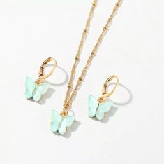 Our gold Growth Set includes one pair of butterfly earrings and one butterfly necklace. Come in royal blue, ocean blue, and lavender. Boho Pendant Necklace, Acrylic Butterfly, Elegant Choker, Sweet Jewelry, Coin Pendant Necklace, Accessories Silver, Butterfly Earrings Stud, Butterfly Pendant Necklace, Necklace Accessories