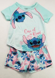 Disney Stitch "One Of A Kind" 2-Piece Pajama Set Girls' Size 4/5 Brand new with tags Smoke free home The galaxy's most adorable alien pet adds a one-of-a-kind touch to her sleepwear with this  Stitch 2-Piece Pajama Set, featuring cute Stitch print pj shorts and a cozy sleep shirt. 2-piece sleep set includes: 1 sleep shirt and 1 pair of shorts Tee: Crewneck; short sleeves;  Stitch graphic print Shorts: Pull-on styling; elastic waistband; Stitch print  Flame retardant  ©Disney, All Rights Reserved Playful Green Sets With Character Print, Cute Sets With Character Print For Playwear, Cute Playwear Sets With Character Print, Cute Character Print Playwear Sets, Cute Sleepover Sets With Character Print, Cute Bedtime Sets With Character Print, Fun Multicolor Sets With Character Print, Cute Multicolor Sets For School, Cute Multicolor School Sets