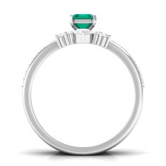 Product Details Bring an elegant touch to her overall look on a special day by presenting our Engagement Ring Set. Embellished with Octagon shape Emerald secured by Prong Setting while dainty Round Diamond studded on enhancer ring. The stunning Emerald Ring Set makes an excellent type of ring that will elevate any outfit with ease. Make her feel out of this world with this Trio Ring Set. Product Information SKU SHP-RINGS032219007 Weight 4.00 gm (Approximate) EMERALD INFORMATION No.of Stones 1 Pieces Total Weight 0.66 Carat (Approximate) Dimension(approx) Emerald Cut-4X6 mm-1 Pcs Color Green Cut Brilliant Shape Emerald Cut Setting Type Prong-Setting Quality Grade AAA DIAMOND INFORMATION No.of Stones 28 Pieces Total Weight 0.68 Carat (Approximate) Dimension(approx) Round-1.20X1.20 mm-23 PcsR Trio Engagement Ring, Trio Ring Set, Enhancer Ring, Trio Ring, Our Engagement, Octagon Shape, 18k Yellow Gold Ring, Engagement Ring Set, Ring Sizer