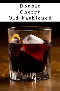 an old fashioned drink in a glass with ice