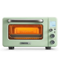 a green toaster oven sitting on top of a white counter