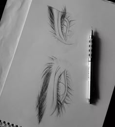 the eye is drawn on paper with a pen