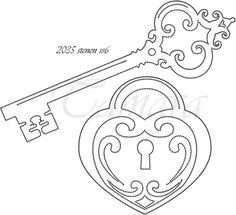 a heart shaped key with the word 2013 written on it and an ornate key in the middle