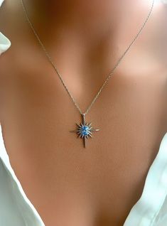 You will shine like a star with this aquamarine north star necklace, if you are going to give it as a gift, know that it will be very appreciated. Silver: 925 sterling silver Stone: Aquamarine Pendant size: 2 cm - 2 cm (0.98 inches - 0.98 inches) Adjustable length: 5 cm (1.96 inches) 📌All the metal components are solid .925 STERLING SILVER (not plated). 📌If you want a different stone color for this necklace, click on this link. https://www.etsy.com/listing/934433389/925-sterling-silver-opal-po Star Silver Necklace, Blue Star-shaped Gemstone Necklace, Star Shaped Sapphire Jewelry Gift, Starburst Fine Jewelry Necklace As Gift, Blue Jewelry With Star Charm For Gifts, Starburst Fine Jewelry Necklace For Gift, Blue Star Charm Jewelry As Gift, Blue Star Charm Jewelry For Gift, Blue Star Of David Jewelry Gift