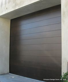 a large garage door in front of a building