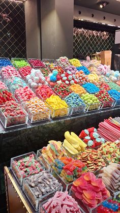 there are many different types of candies on display