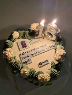 a birthday cake with candles and pictures on it