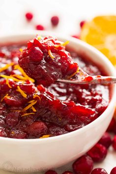 cranberry sauce with orange zest in a white bowl