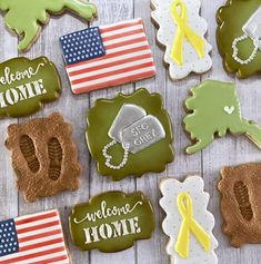 decorated cookies with the words welcome home and american flags on them are arranged in rows