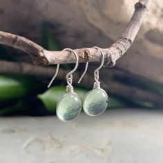 "Light Green Tint Raindrop Sterling Silver Aesthetic Earrings, Medium Size, Minimalist Jewelry, Handmade Jewely, Nature Lover Gift for Her This collection is inspired by the beauty of rain and the rainbow of colors seen in nature. This is the perfect gift for anyone that loves nature, simplicity, and a customizable look! The sparkle is subtle and simple and changes depending on the lighting and the colors behind the glass. This wanderlust, boho, hippie style earrings are the perfect gift for her Silver Aesthetic, Aesthetic Earrings, Art Glass Jewelry, Boho Hippie Style, Delicate Earrings, Gifts For Nature Lovers, Style Earrings, Matching Necklaces, Drop Necklace