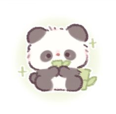 a panda bear holding a leaf in its paws