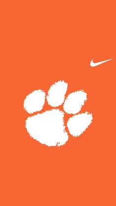 an orange background with a white nike logo