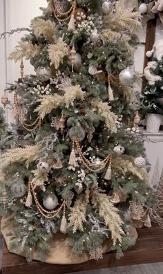 a decorated christmas tree with ornaments on it