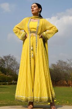 Shop for Surbhi Gupta Yellow Georgette Embroidered Cape And Pant Set for Women Online at Aza Fashions Angrakha Kurta, Indian Kurti Designs, Haldi Outfit, Indian Fashion Trends, Cute Casual Dresses, Indo Western Dress, Wide Trousers, Yellow Jacket, Designer Dresses Indian