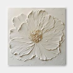 a large white flower is mounted on the wall in an art work style with acrylic paint