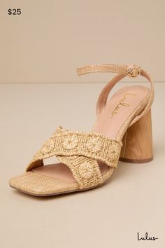 Easily elevate all your favorite warm weather looks with the Lulus Chaya Natural Raffia Ankle Strap High Heel Sandals! These summery heels have a woven raffia construction that shapes a trendy square footbed and crisscrossing toe straps adorned with woven floral-inspired details. Matching straps sprout from the sides to wrap and secure around the ankle with a dainty gold buckle. A sculpted, wood-look block heel lends a unique finish to this chic design! 3. 75" sculpted wood-look heel. Cushioned Ankle Strap Heels With Padded Heel For Vacation, Padded Heel Ankle Strap Heels For Vacation, Heels With Padded Heel And Ankle Strap For Vacation, Beach Heels With Padded Heel And Ankle Strap, Beige Ankle Strap Block Heels For Summer, Spring Beige Ankle Strap Block Heels, Chic Natural Heels For Vacation, Chic Natural Color Heels For Vacation, Ankle Strap Heels With Wrapped Heel For Vacation