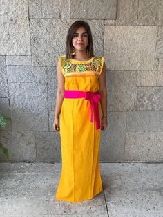 "Beautiful embroidered dress, ideal for spring and summer, mexican parties, etc. Bright and colourful. Sleeveless Loose fit Includes the fabric sash. Fits size Small Measurements taken flat: Armpit to armpit 18\" Width 22\" Length 61\"" Summer Embroidered Sleeveless Gown, Traditional Embroidered Summer Gown, Embroidered Sleeveless Maxi Dress, Traditional Sleeveless Embroidered Fiesta Dress, Traditional Sleeveless Embroidered Dress For Fiesta, Cotton Sleeveless Fiesta Dresses, Sleeveless Floral Embroidered Dress For Fiesta, Sleeveless Cotton Dress For Fiesta, Embroidered Maxi Sundress