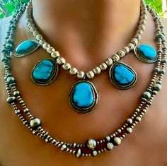 💙🖤Beautiful vintage sterling silver five-turquoise necklace. This necklace measures 15.5" and we can add some Sterling rings to bring it up to 17". 💙🖤Each pendant measures between 1" and 1 1/4", the middle one beingvthe biggest. The turquoise is absolutely VIBRANT and SPECTACULAR. 💙🖤This necklace is absolutely lovely and will enhance any outfit or Southwestern lineup! Vintage Turquoise Necklace With Oxidized Finish As Gift, Vintage Turquoise Jewelry With Oxidized Finish, Silver Turquoise Necklace Stamped 925, Vintage Silver Turquoise Necklace With Natural Stones, Vintage Turquoise Necklace For Collectors, Vintage Oval Turquoise Necklace, Sterling Silver Turquoise Necklace With Large Pendant, Vintage Blue Necklace Stamped 925, Vintage Blue 925 Stamped Necklaces