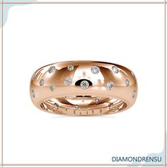 a rose gold ring with diamonds on it