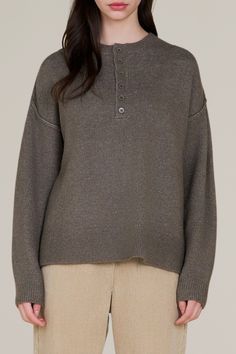 experience the perfect blend of comfort and elegance with our this button down pullover sweater. designed with a soft, sweater fabric, this pullover offers both warmth and style for the cooler seasons. the button down detail provides a classic touch, making it versatile for both casual and dressier occasions. available in a variety of colors, this sweater is a must-have in any wardrobe. layer it over a collared shirt for a sophisticated look or wear it alone for a more relaxed vibe. Sweater Fabric, Soft Sweater, Collar Blouse, Collared Shirt