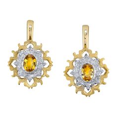 These beautifully handmade and engraved earrings are a lovely marriage of 18k yellow and white gold set with a lovely matched pair of bright yellow sapphires. Flattering, neutral, and not too much of a dangle... these could be 'go-to' earrings that make you feel special every day. They can dress up a casual outfit or be the finishing touch on an elegant evening gown! Entirely handmade in 18k gold by our Master Jewelers in Los Angeles, the intricate hand engraving and refined finishes are perfect Pretty Earrings Dangle, Engraved Earrings, Sapphire And Diamond Earrings, White Gold Set, Yellow Gold Earring, Gothic Jewelry, Lovely Jewellery, Yellow Sapphire, Elegant Earrings