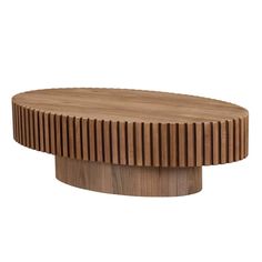 a round wooden table with wavy lines on it