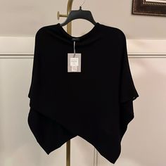 Nwt Black Adelyn Poncho One Size Jersey Knit Feel Would Make A Perfect Nursing Cape Questions? Leave A Comment Below! Black Poncho With Batwing Sleeve One Size, Black Poncho With Batwing Sleeve, Black Batwing Sleeve Poncho One Size, One Size Black Tops For Winter, Black Batwing Sleeve Sweater For Layering, Chic One Size Poncho With Batwing Sleeve, Batwing Sleeve Poncho For Layering, Black Knit One-size Poncho, Oversized Black Knit Poncho