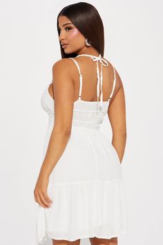 Available In Navy And Off White. Mini Dress Scoop Neck Adjustable Spaghetti Straps Neck Tie Smocked Waist Lined Self: 100% Rayon Lining: 100% Polyester Imported | Raveena Mini Dress in Off White size Small by Fashion Nova Sleeveless Sundress With Built-in Bra For Vacation, Vacation Camisole Sundress With Adjustable Straps, Summer Camisole Mini Dress For Vacation, Cami Sundress For Vacation, Casual White Strappy Dress, Casual Sleeveless Mini Dress With Built-in Bra, Vacation Camisole Sundress, Beach Sundress Camisole Mini Dress, Beach Sundress Mini Dress Camisole Style