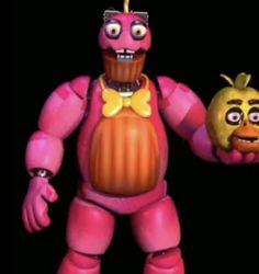 a pink robot holding an orange pumpkin in his right hand and wearing a yellow bow tie