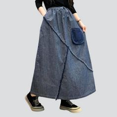 Introducing our lengthy high-waist women's denim skirt from the 2023 Autumn-Winter Collection, a must-have piece for the street style fashionista!Distinctive Features: Street Chic: Embrace the urban trends and make a statement with this denim skirt, perfect for any street vibe look. Patchwork Perfection: This skirt features a unique patchwork design, adding a touch of creativity and individuality to your outfit. Long and Lovely: The length of this skirt elongates your legs and creates a flatteri