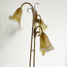 Incredible vintage regency metal and glass floor lamp. Features three glass tulip lamp shades on three gold stems. Tulip Lamp, Glass Floor Lamp, Glass Floor, Desk Light, Lamp Shades, Floor Lamp, Tulips, Shades, Desk