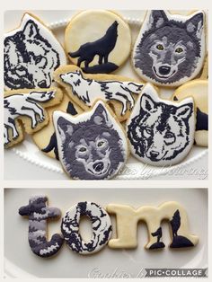 some cookies that are decorated to look like wolfs and the word i love you