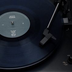 an old record player with its turntable removed from the top and on it's side