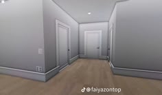 an empty room with three doors and no one in it