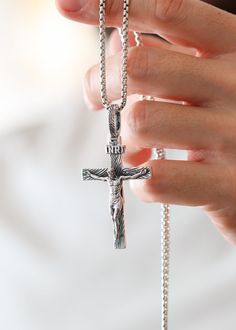 A Catholic Silver Cross is the perfect way to show your faith and devotion. This beautiful and intricate cross symbolizes the love and mercy of God. Crafted with exquisite attention to detail, it’s a stunning reminder of your faith that you can carry with you. Let it be a sign of your enduring faith. Sterling silverPendant: 65 x 35 mmBail size: 12.8 x 6.5 mmPlease note: pendant only; chain sold separatelyShown with: ROUND BOX SILVER CHAIN (2.6 MM) Processing time 1-3 business days Engraved Cross Jewelry For Blessing, Spiritual White Gold Crucifix Cross Necklace, White Gold Crucifix Necklace Spiritual Style, Spiritual White Gold Crucifix Necklace, White Gold Crucifix Necklace, Engraved White Gold Cross Necklace, Luxury Silver Cross Necklace, Luxury Sterling Silver Cross Necklace, Luxury Silver Cross Necklace As Gift